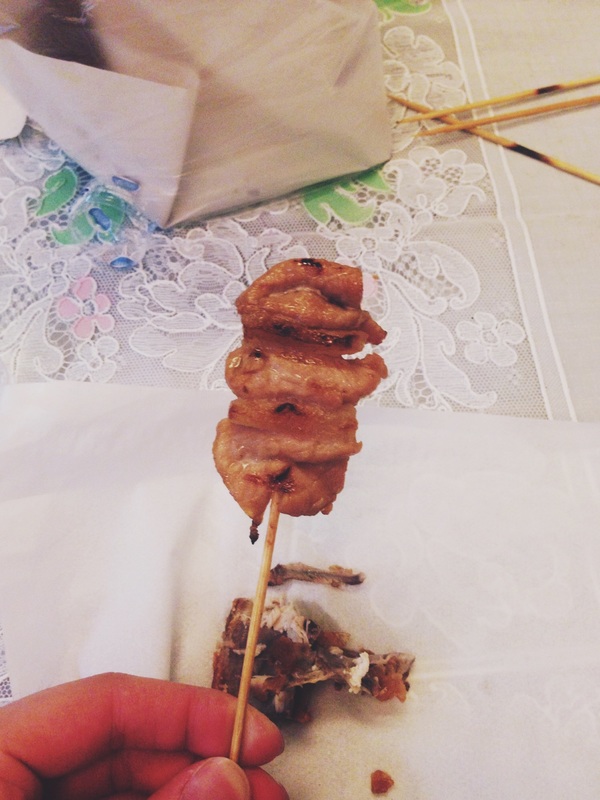Colored Photograph of a Pork Skewer.